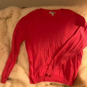 Forever 21 coral colored sweater with hole details. Size M